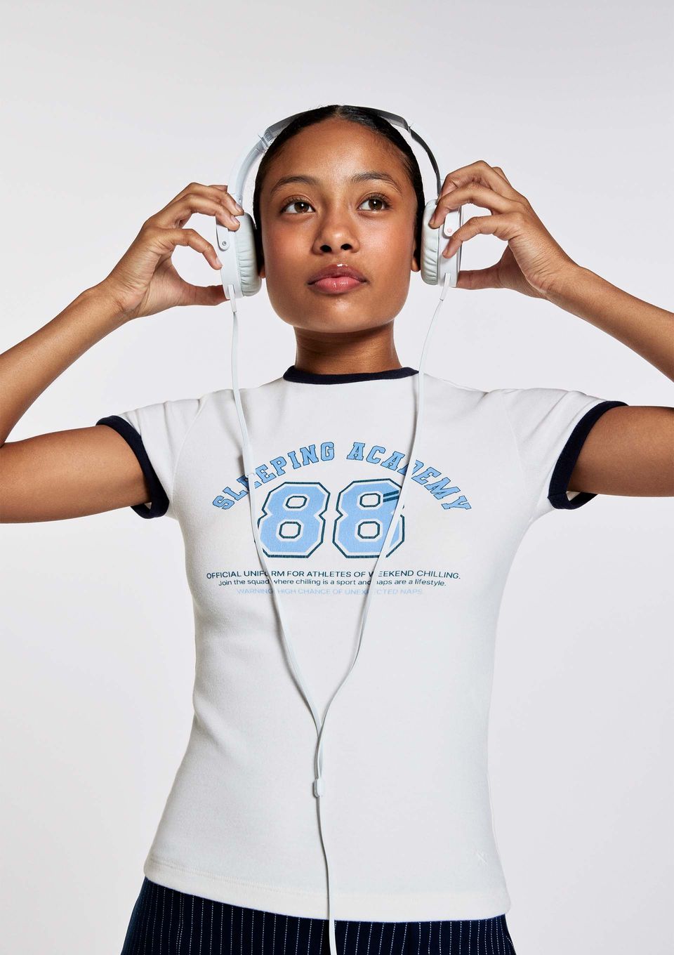 Camiseta Teen com Estampa e Friso Contrastante - Azul