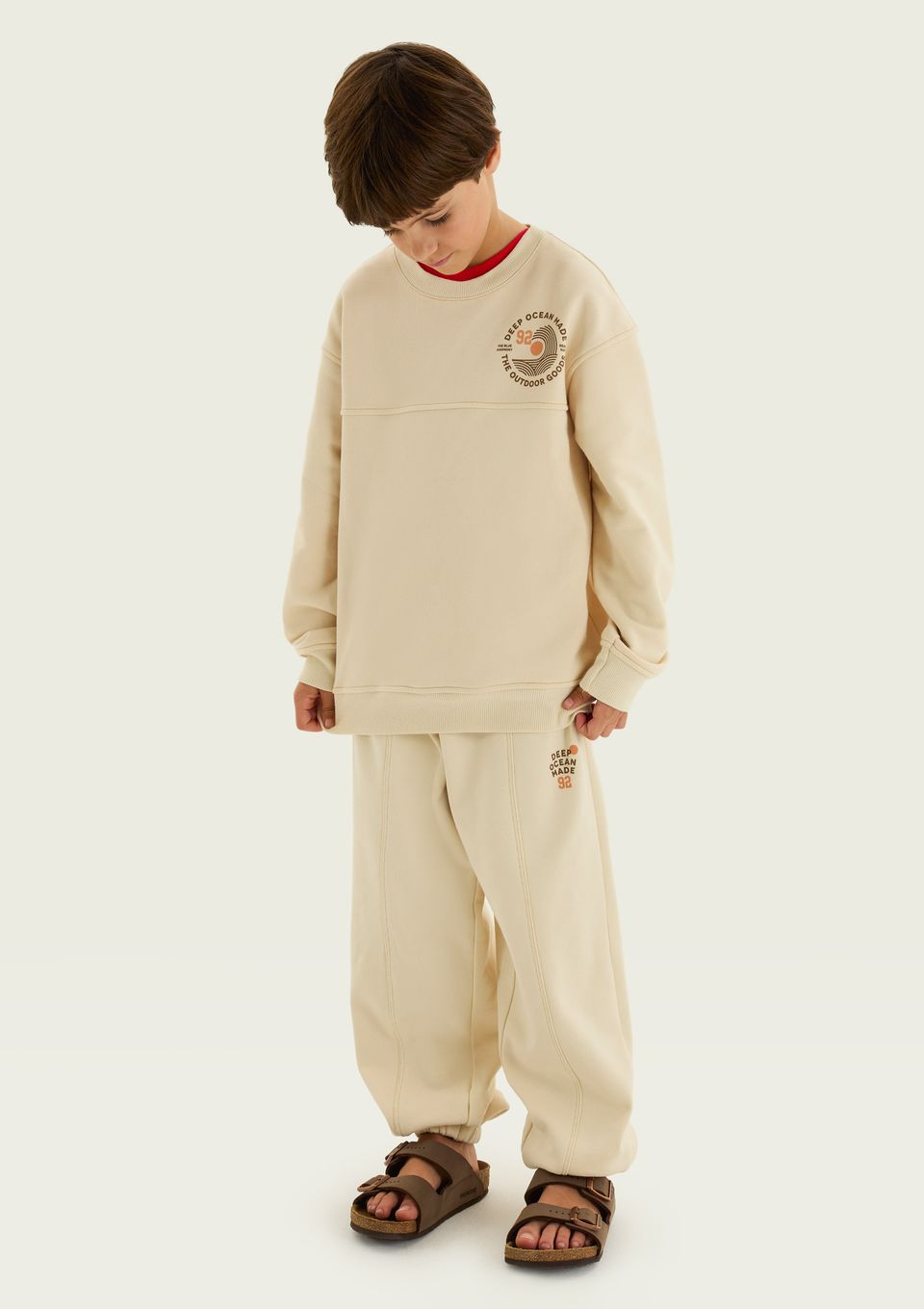 Calça Infantil Menino Jogger em Moletom Peluciado - Creme